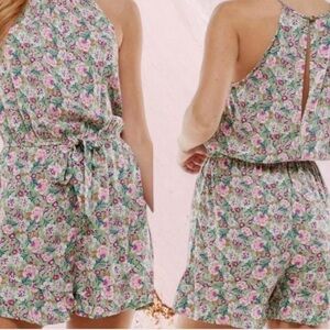 Floral Halter Neck Sleeveless Ruffled
Romper, by Kingston Gray.